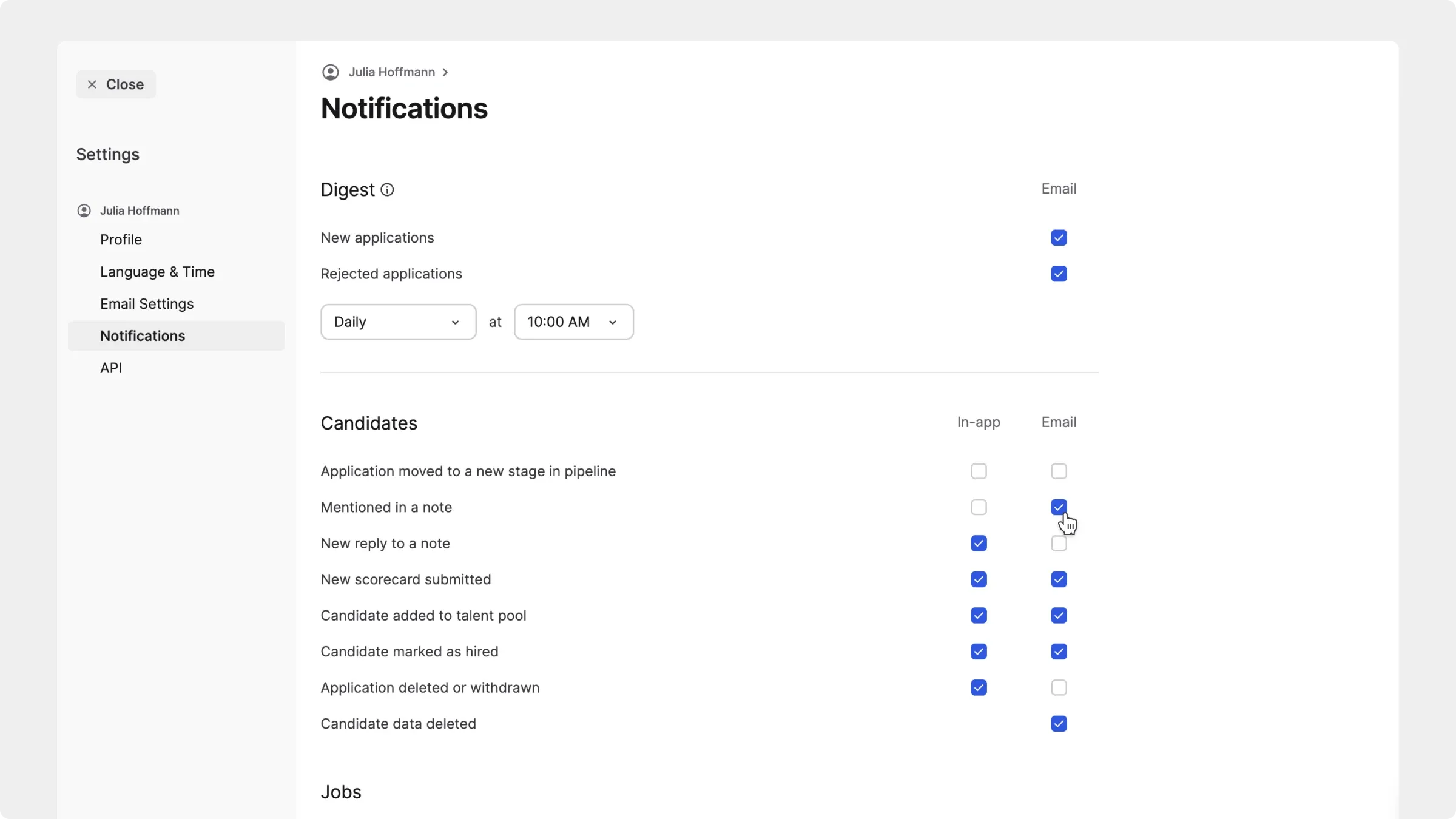 Notification settings with in-app and email preferences for candidate and job activity